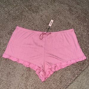 NWT Victoria’s Secret large pink sleep shorts with satin drawstrings.